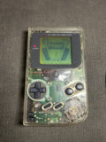 Rear of clear-shell Nintendo Game Boy with DMG-01 model label