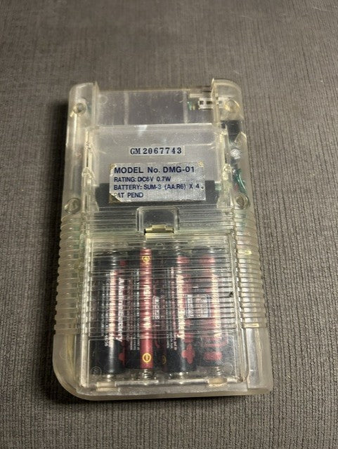 Front of clear-shell Nintendo Game Boy displaying Frogger